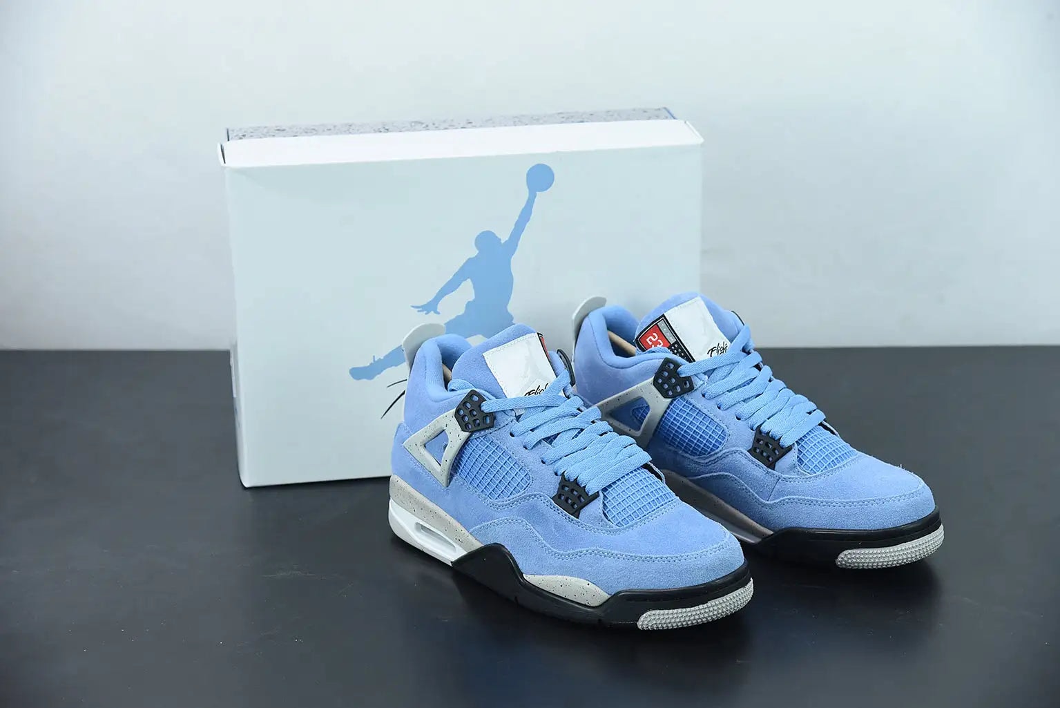 Nike Air Jordan 4 "University Blue" - Imagen 1